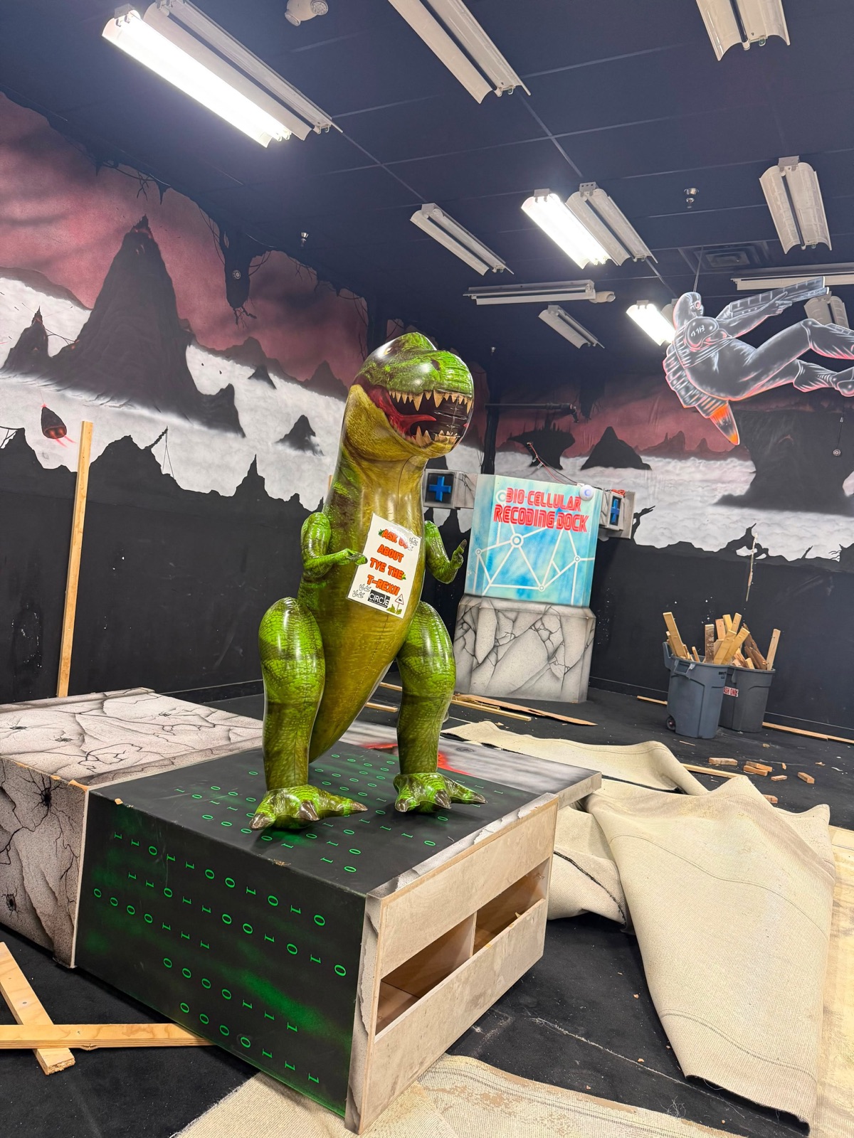 Tye the T-Rex in the half-demolished arena